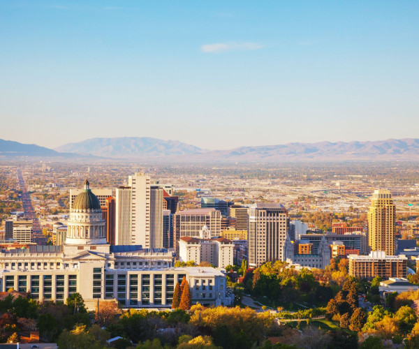 City skyline with mountains in the distance