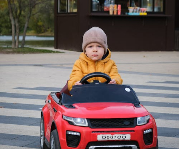 Baby with toy car