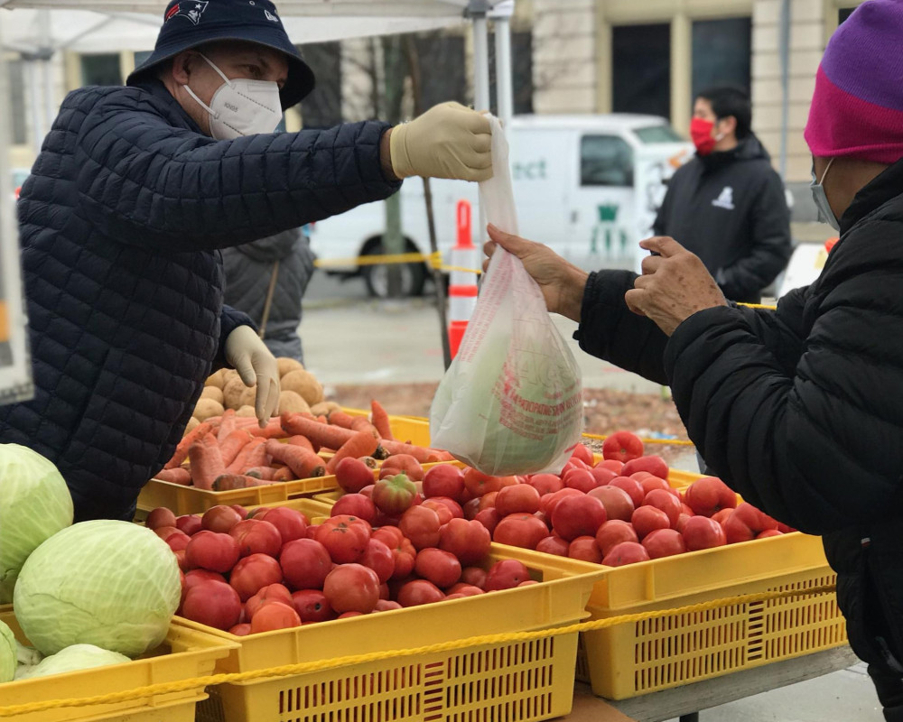 Buying winter vegetables at the farmers market